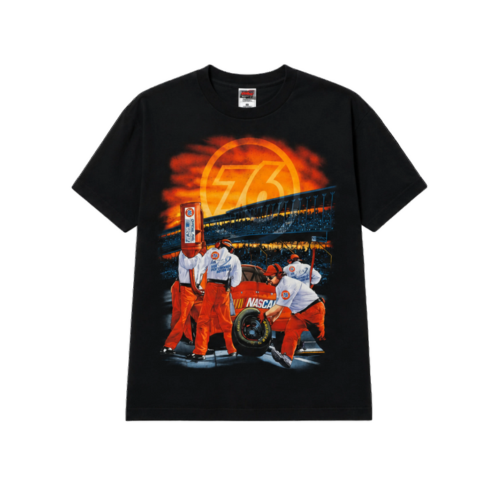 Black t-shirt with a graphic of race car mechanics and flames on a white background