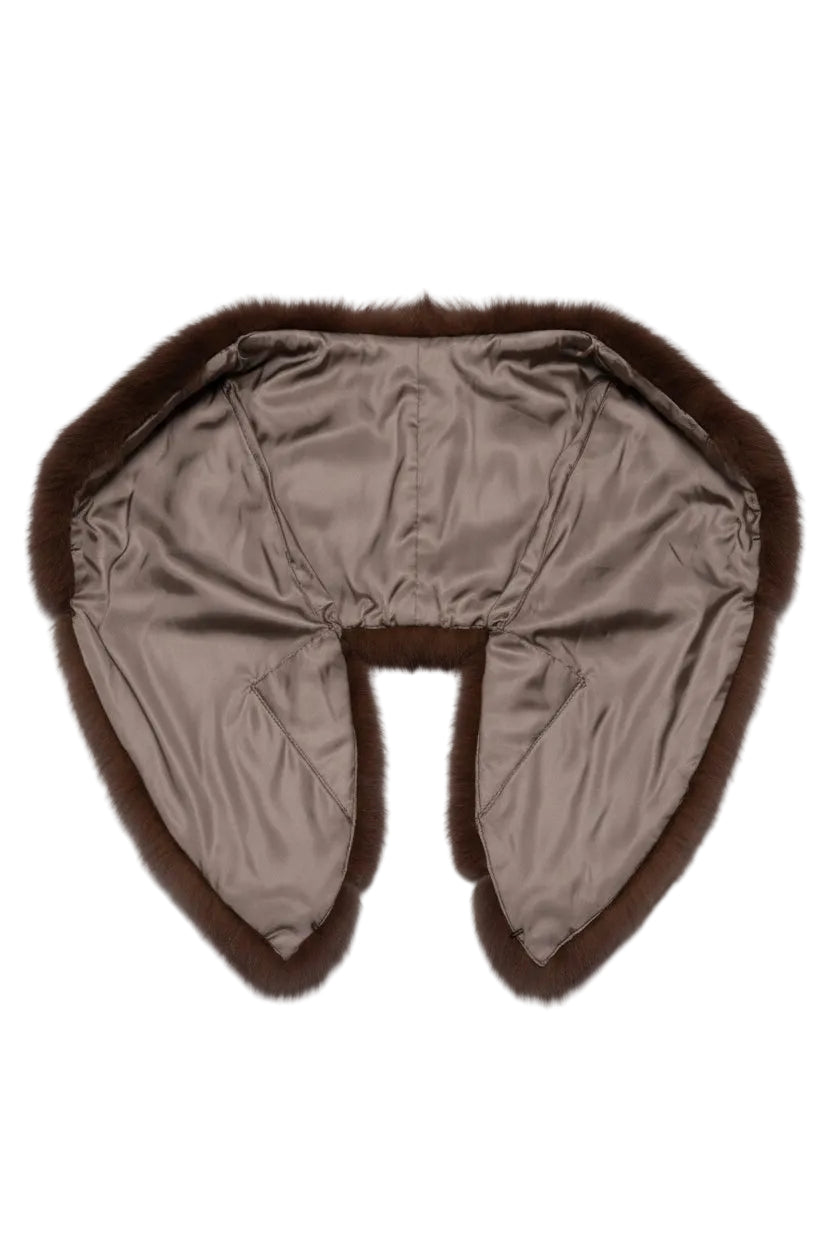 Brown fur hat with ear flaps on a white background