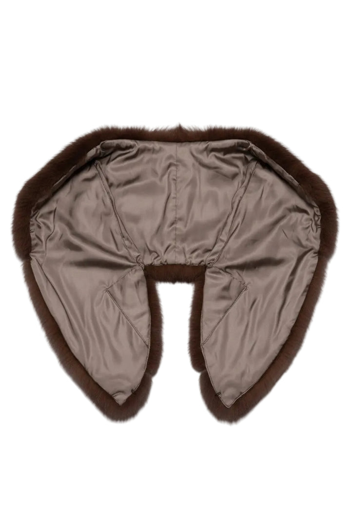Brown fur hat with ear flaps on a white background