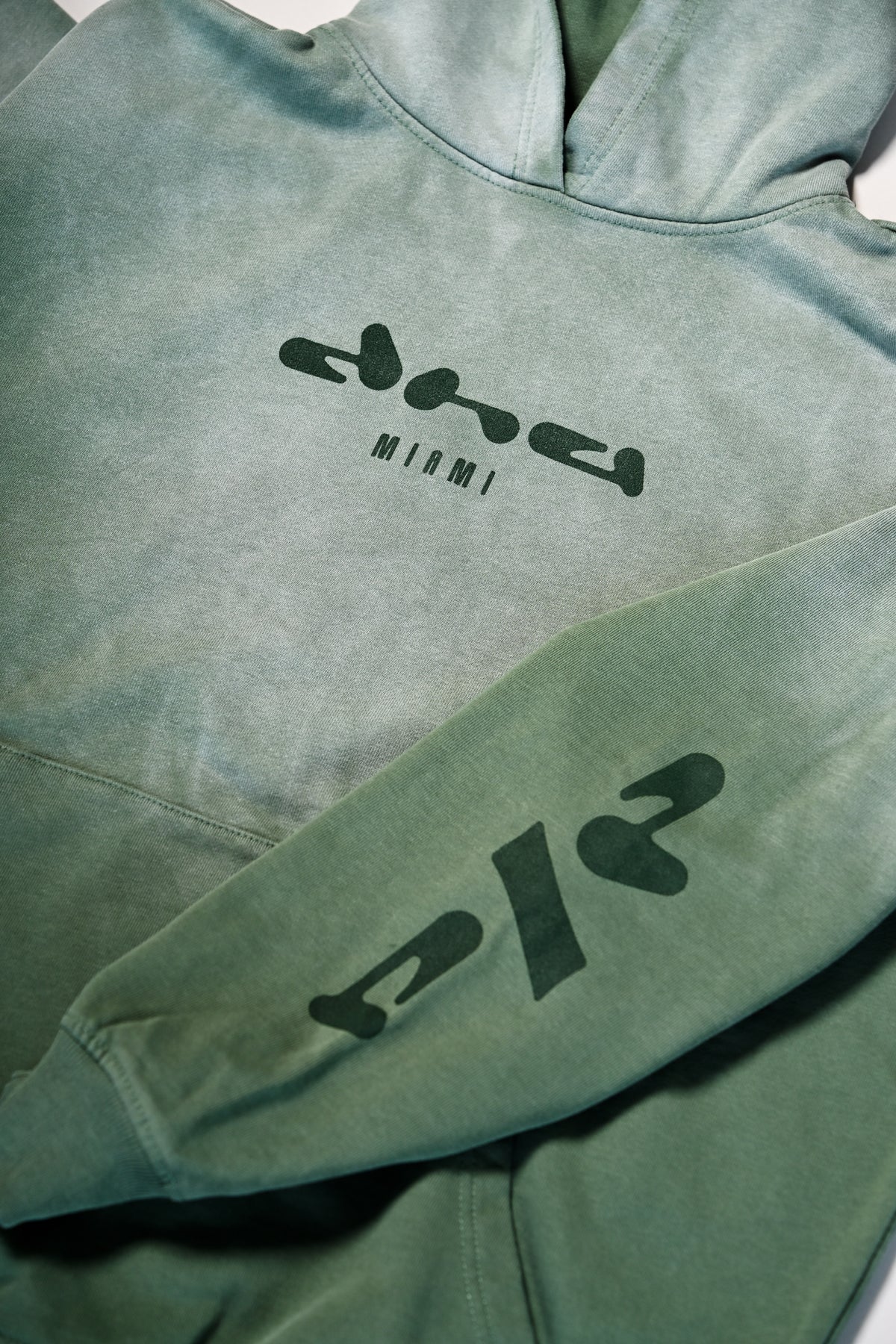 The Source Hoodie - Olive Smoke