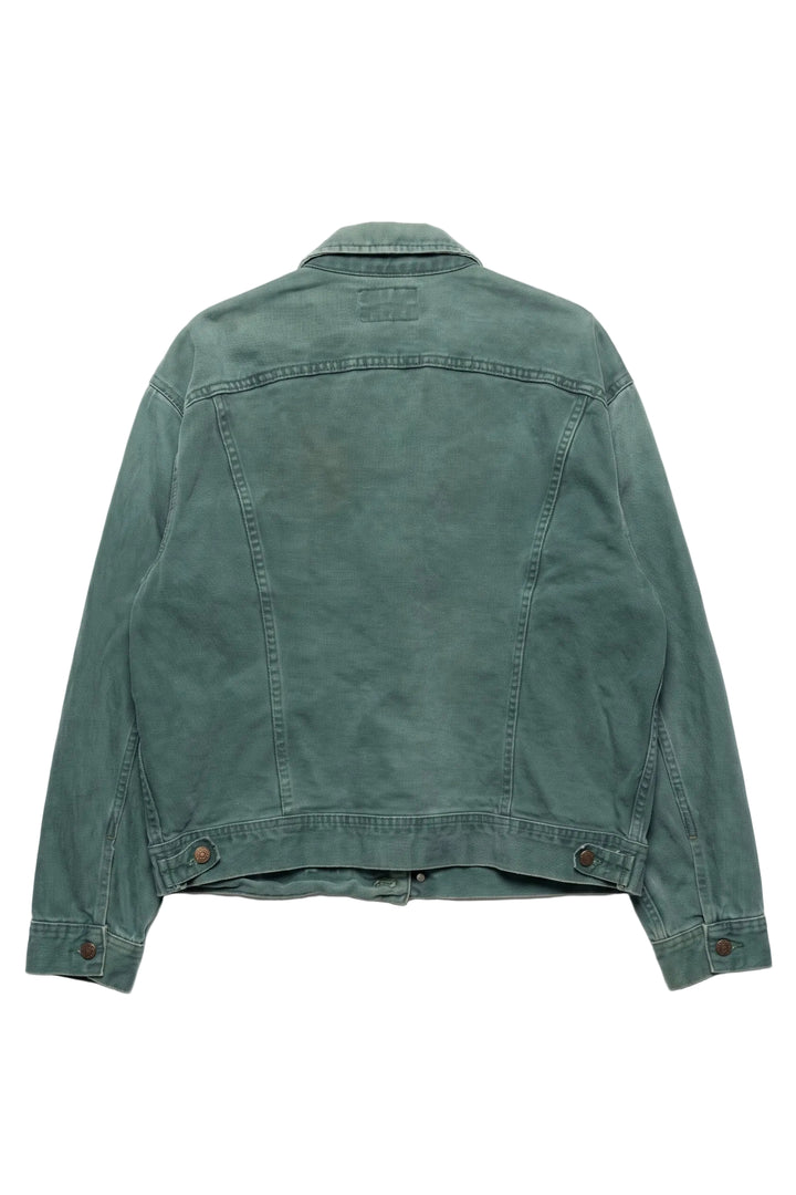 Green denim jacket on a white background