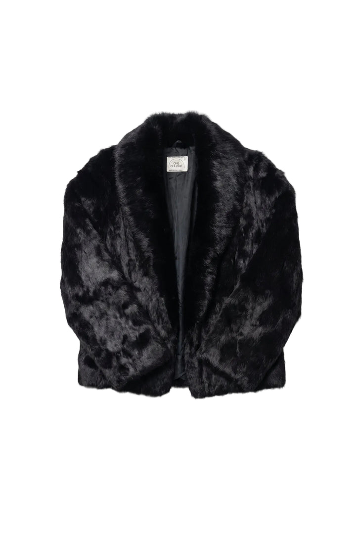 Black fur jacket on a white background