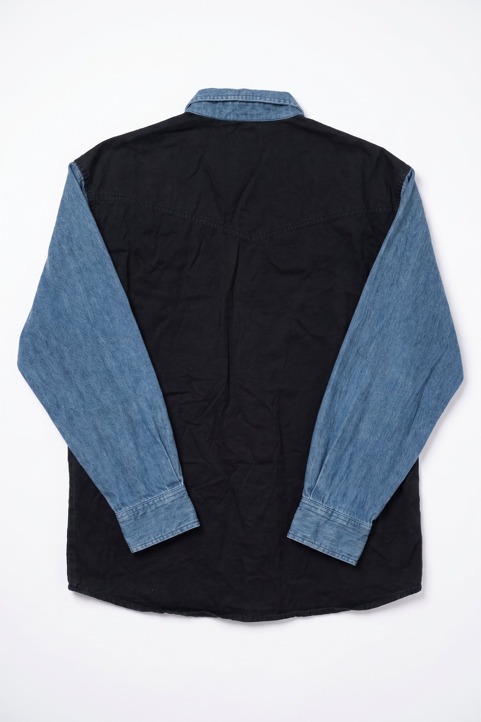 Black shirt with blue sleeves on a white background
