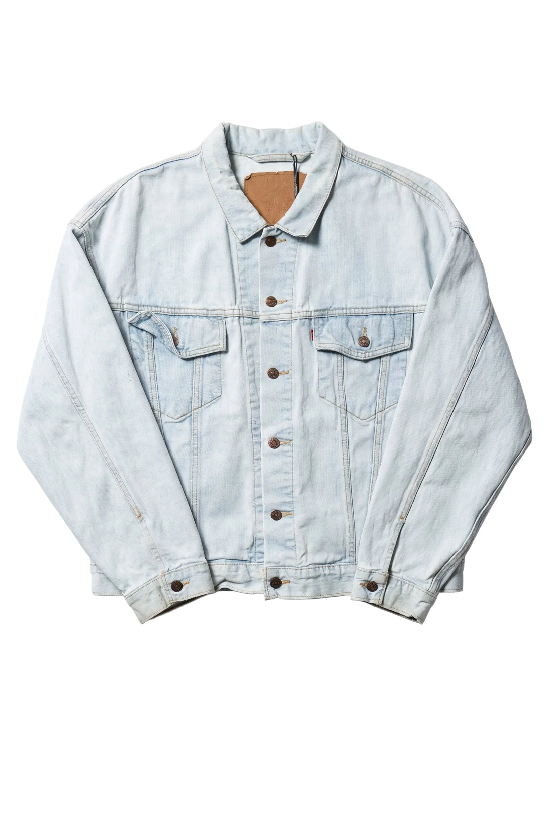 Light blue denim jacket on a white background