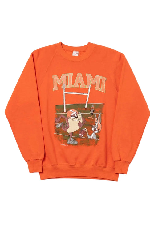 Orange sweatshirt with 'MIAMI' and sports-themed graphic on a white background