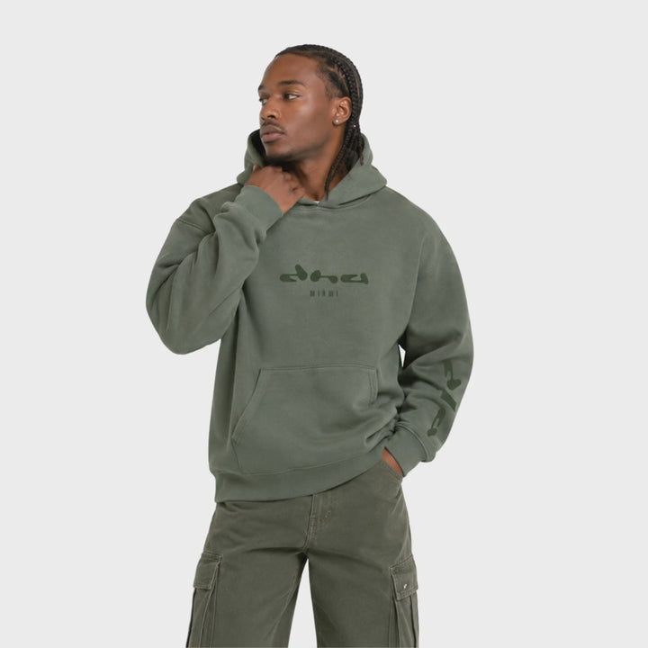 DNA in motion — The Source Hoodie - Olive Smoke turnaround